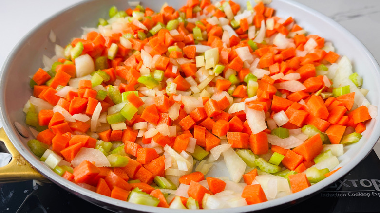 Diced carrot, celery, and onion in pan