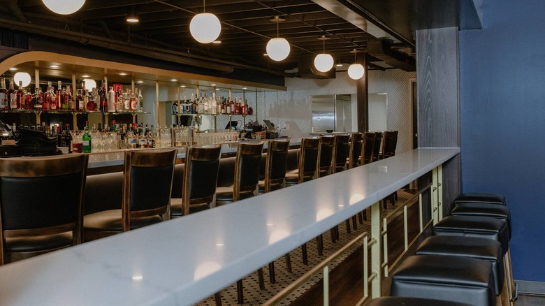 Interior of The Drawing Room, including bar counter and seating