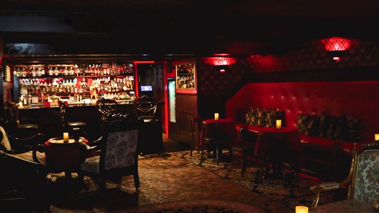 Seating area and bar inside Hale House Speakeasy