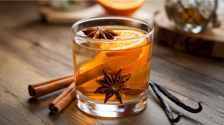 Homemade spiced rum with star anise, oranges, and cinnamon