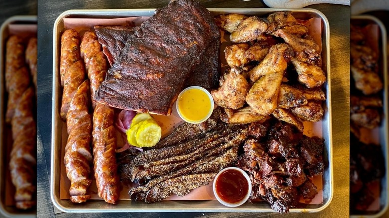 A pile of meats from Woodpile BBQ Shack