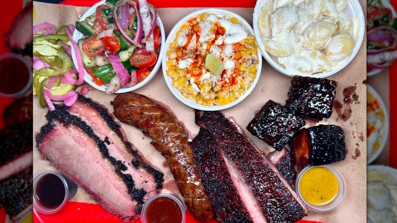 A plate of meats and sides from Chef J BBQ in Kansas City