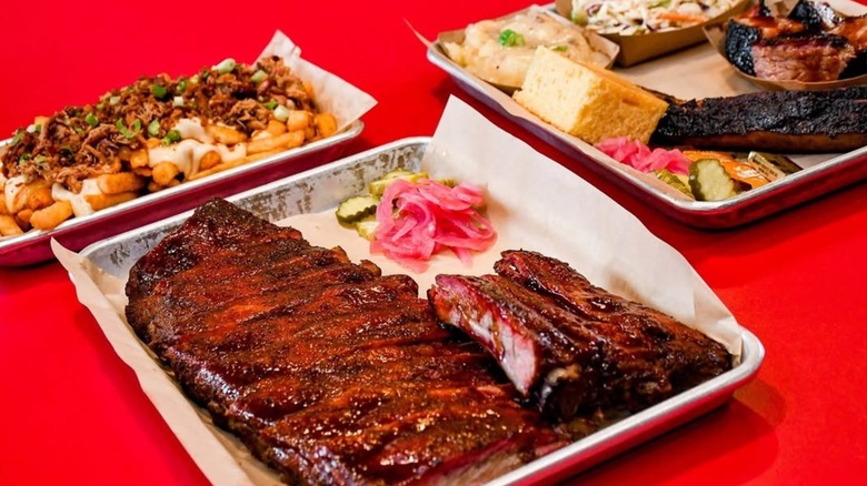 Platters of meats and sides from Porky Butts