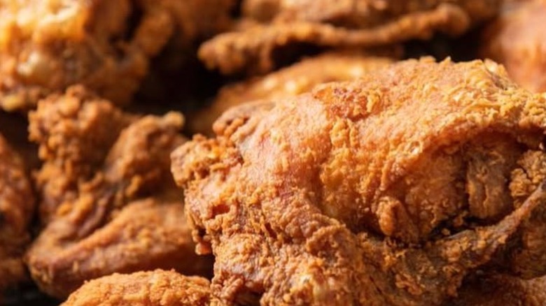 Close-up on pile of fried chicken.