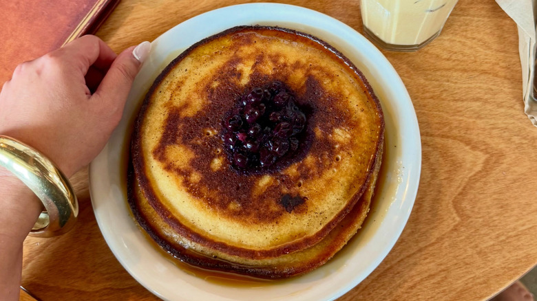 A plate of blueberry pancakes at Café Telegrama