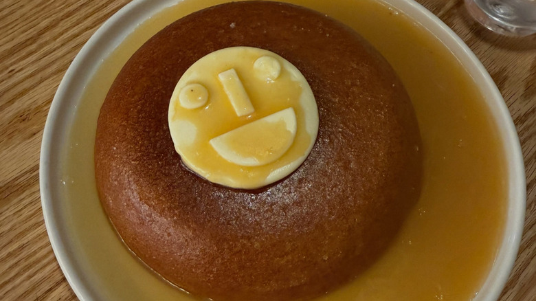 A pancake with butter and syrup at Middle Child Clubhouse
