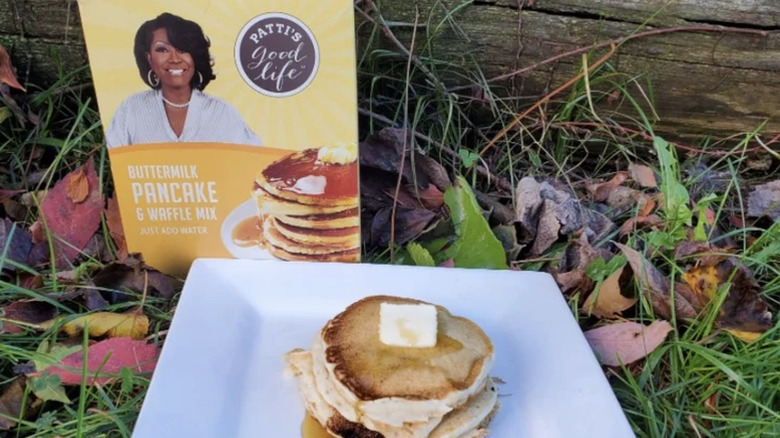 a box of Patti's Good Life pancake mix, and plate of pancakes