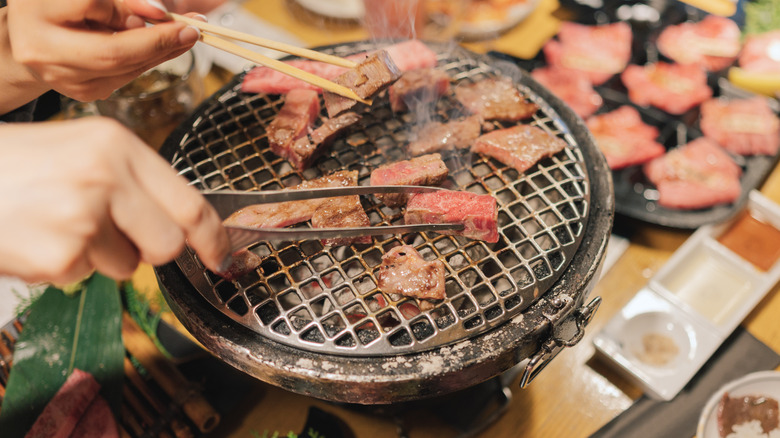 Person grilling A5 wagyu beef