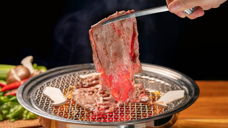 Slice of wagyu over grill