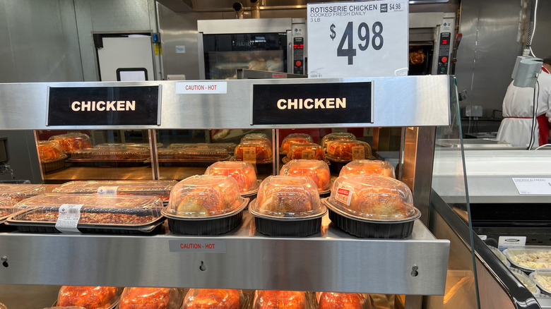 Rotisserie chickens stock the warming shelves as a Sam's Club.