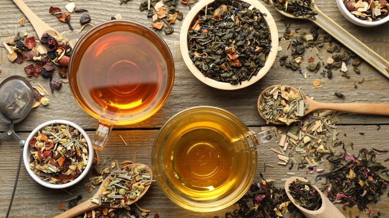 A selection of herbal teas on a wooden table