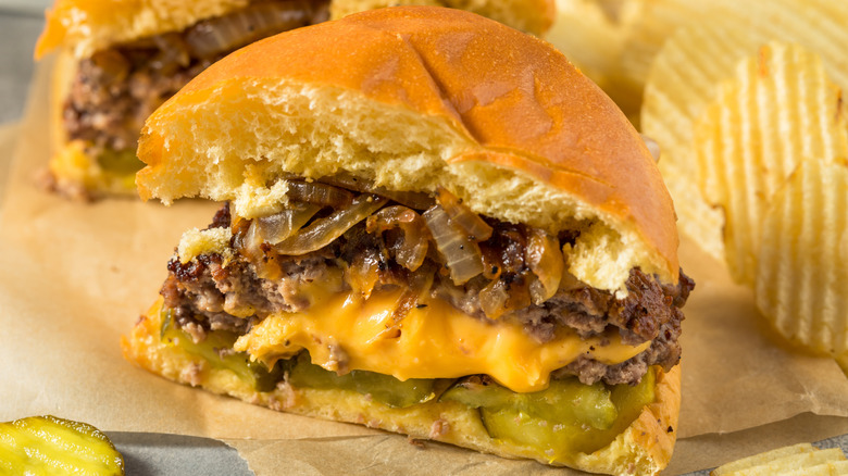 homemade juicy lucy burger served with potato chips