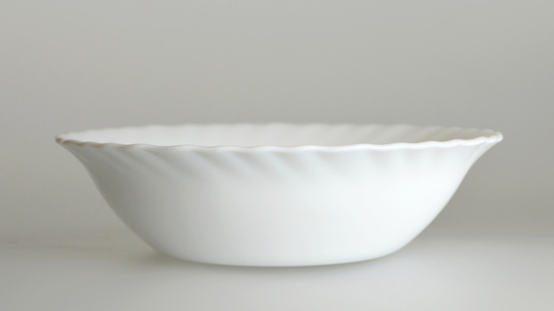 Milk glass bowl with wavy rim