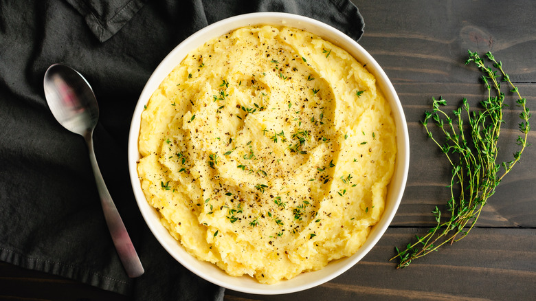Mashed potatoes in white bowl