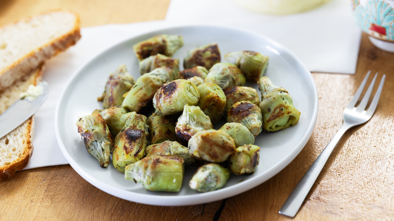 Roasted artichoke hearts on a plate