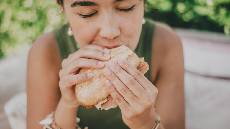 Woman eating a sandwich