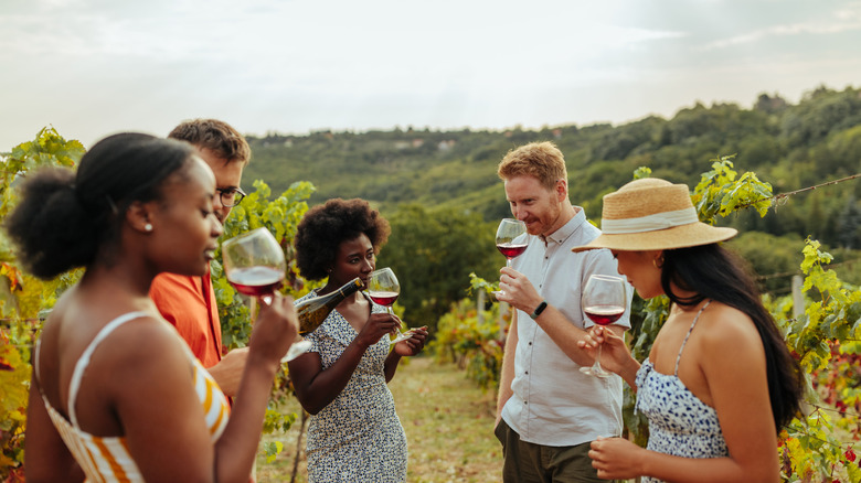 A group of people at a wine tasting