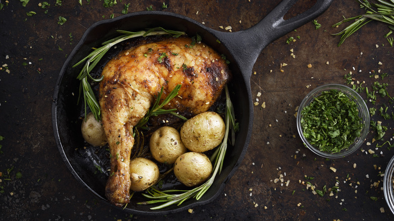 cast iron skillet with chicken leg