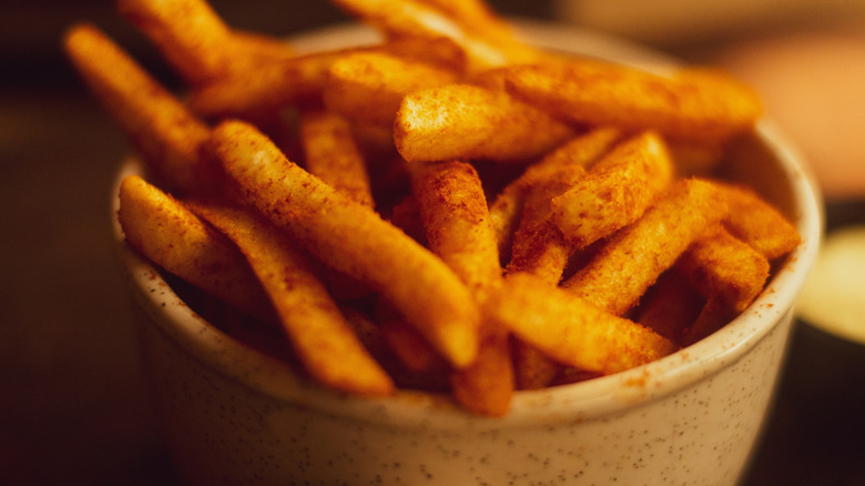 a bowl of peri peri fries