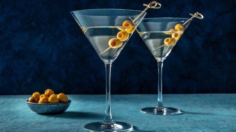 Two martinis sitting on a table