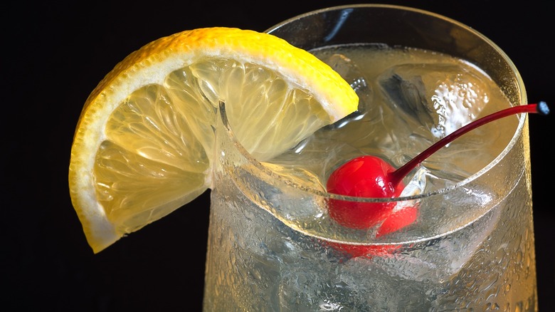 Top of gin cocktail with lemon wedge