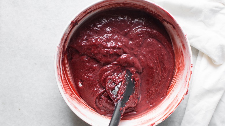 a bowl of red velvet brownie batter