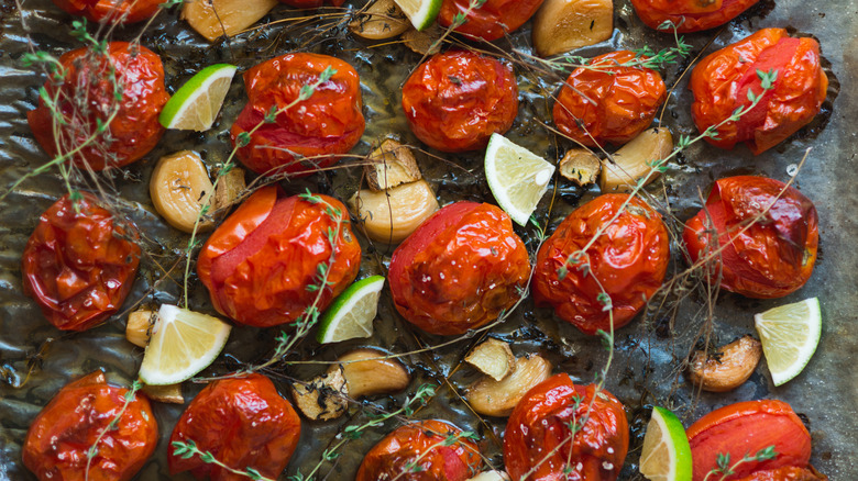 Roasted Roma tomatoes with herbs, lime, and garlic