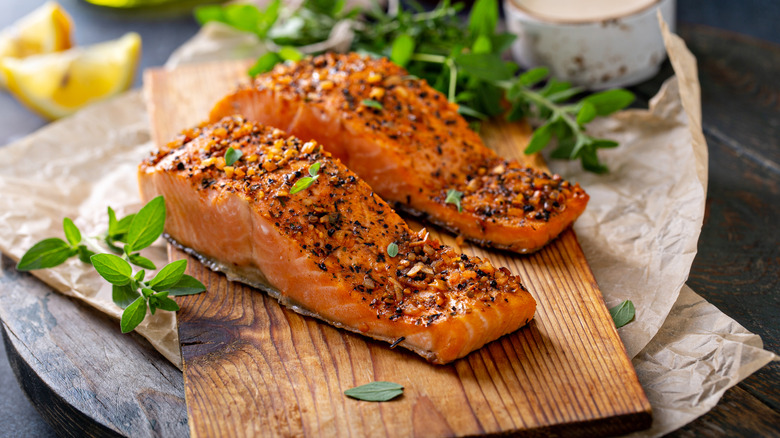Grilled salmon served on a plank