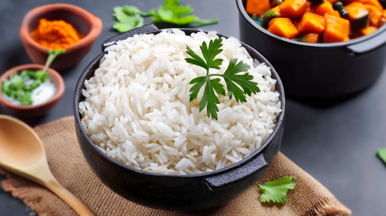 cooked white rice garnished with parsley