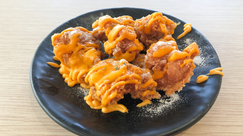 fried chicken covered in cheese powder