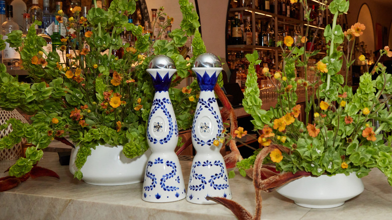 Two Clase Azul bottle on restaurant bar.