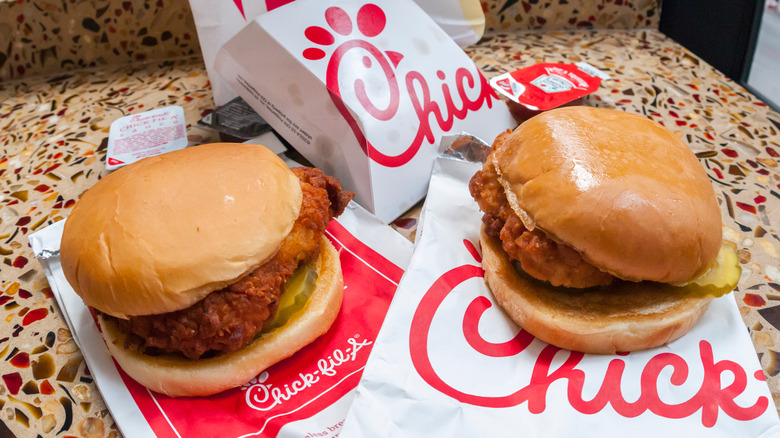 Chick-fil-A chicken sandwiches on top of branded packaging