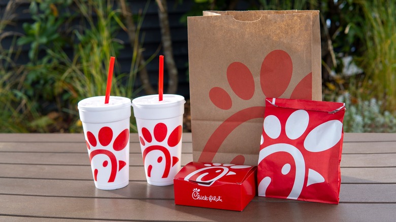 Chick-fil-A branded packaging on outdoor table