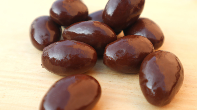 Chocolate-covered almonds on a table