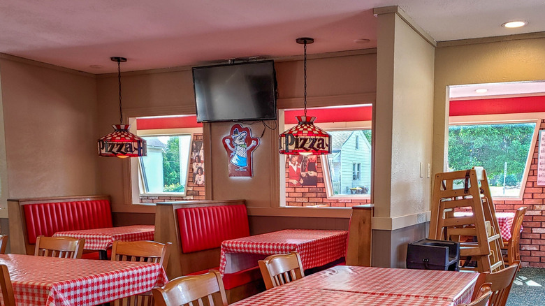 Pizza Hut interior with branded Tiffany-style lamps