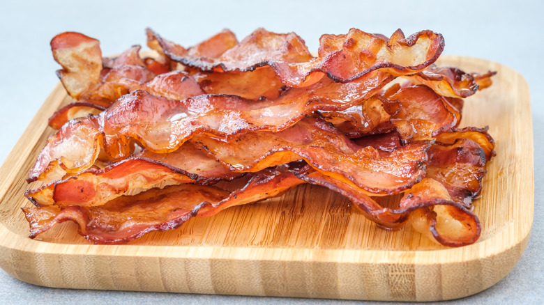 bacon on wood plate