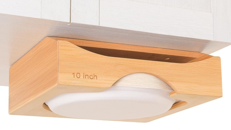 A bamboo paper plate organizer.