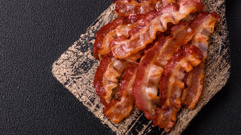 Bacon on wooden board