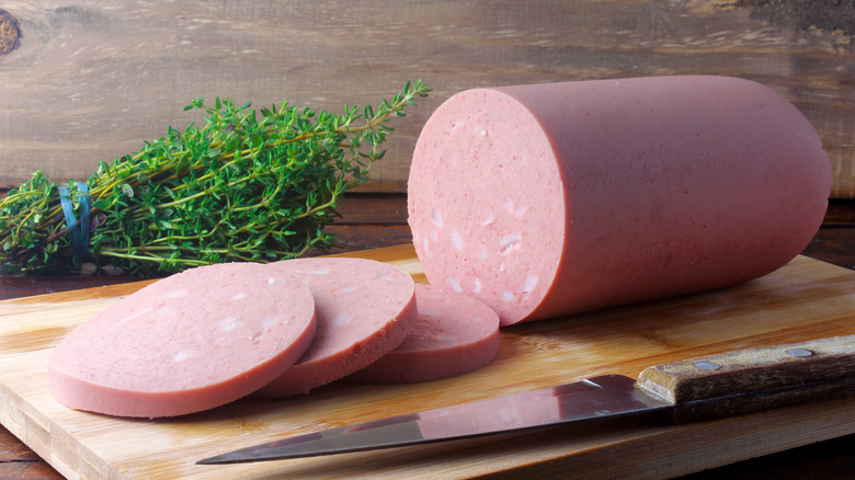 Pork bologna on a cutting board.