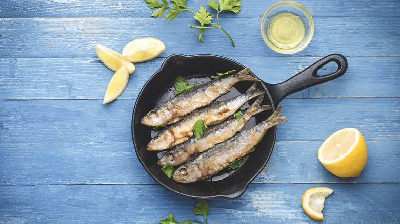 Cooked sardines on pan
