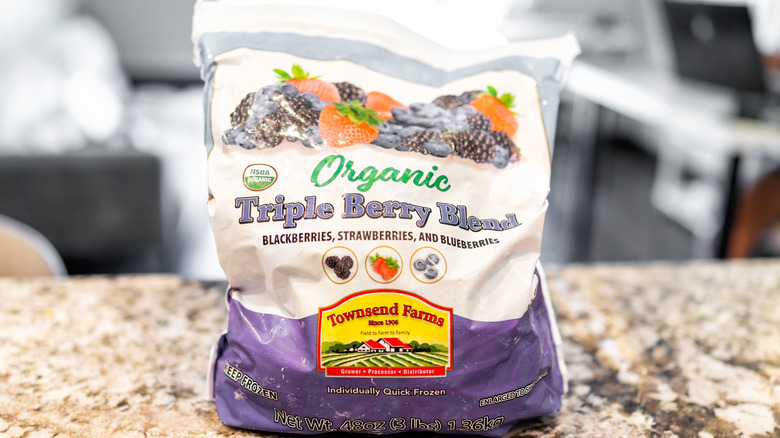 Bag of Townsend Farms brand organic triple berry blend on a counter