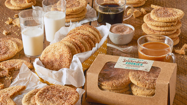 Trader Joe's snickerdoodle cookies and various drinks all over a table