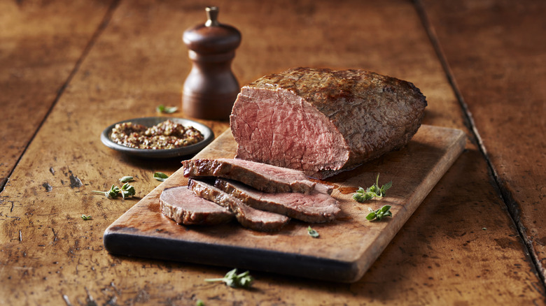 Roast beef sliced on a board