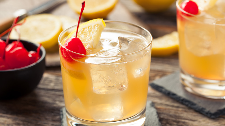 Whiskey sour simple cherry garnish