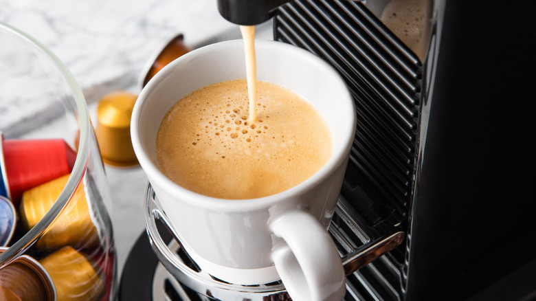 coffee pouring out of machine