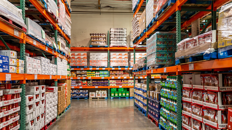 Costco warehouse aisle stocked with bulk goods