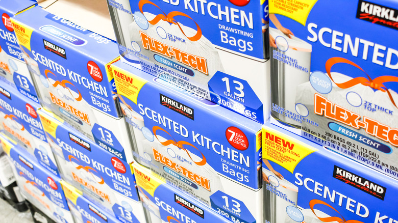 Boxes of Kirkland scented Flex-Tech drawstring trash bags