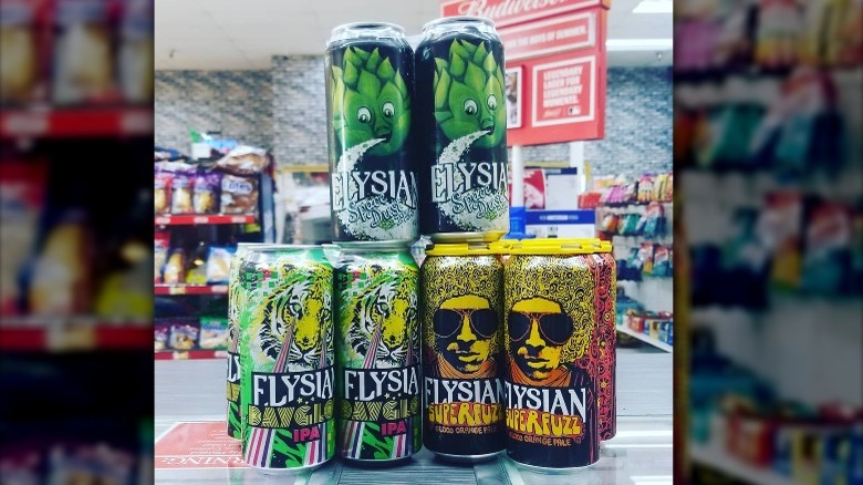 Stack of Elysian Brewing beers in store. 