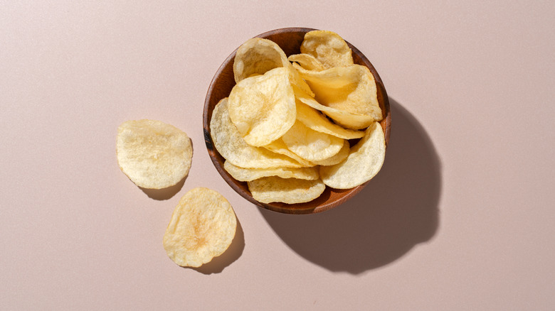 Aerial view of bowl of potato chips