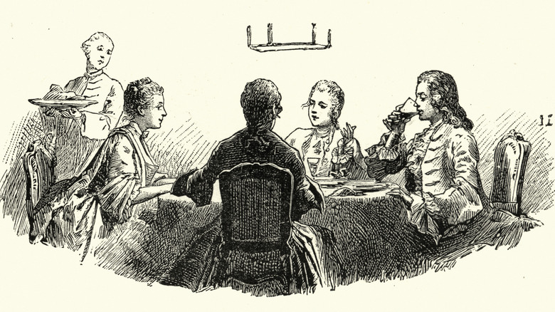 A drawing of 18th century French people eating dinner